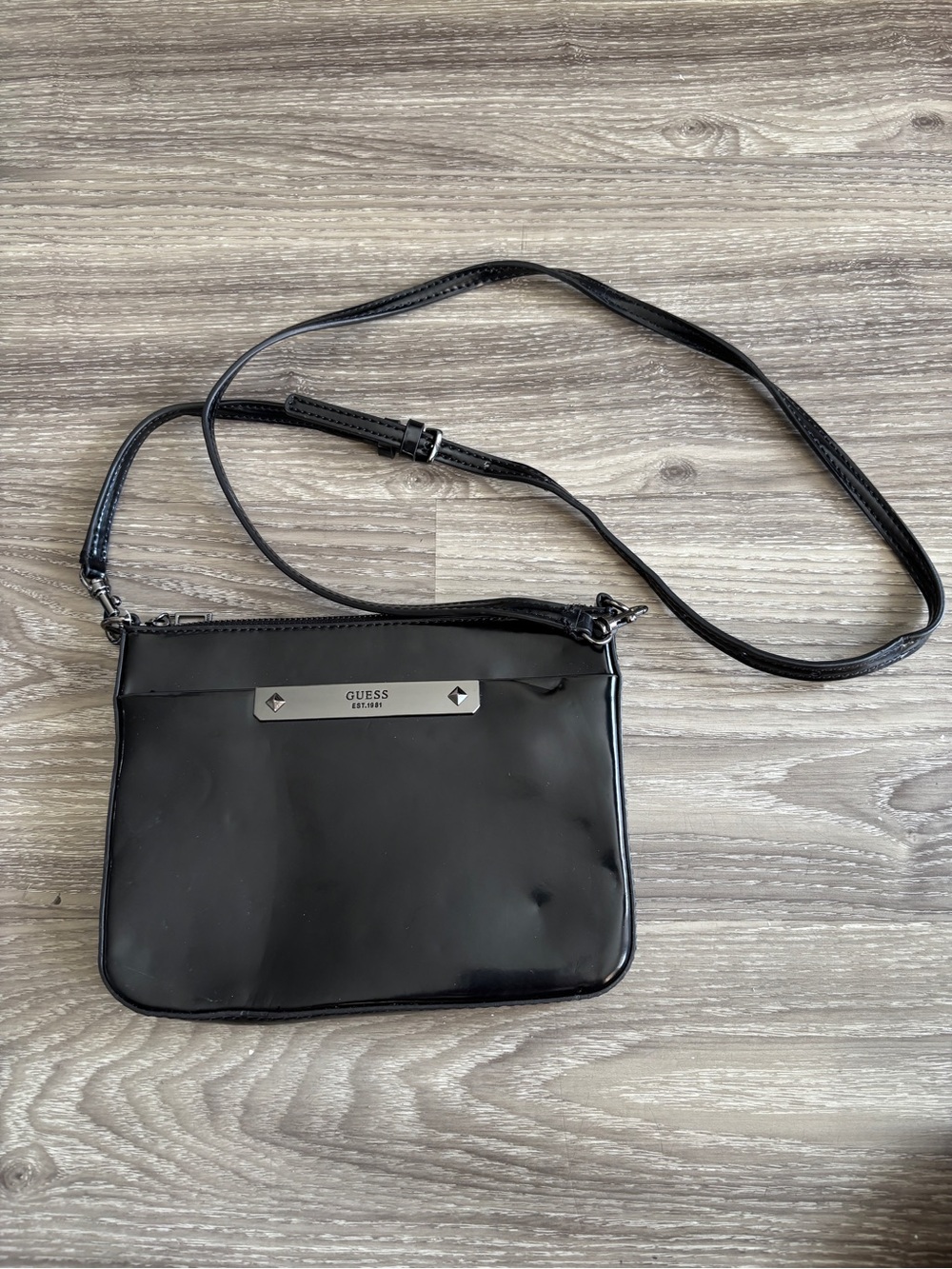 Guess Black Patent Crossbody with Silver Logo Plate